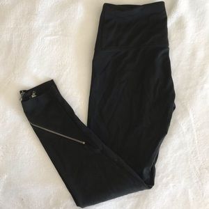 black leggings with zippers on the ankle